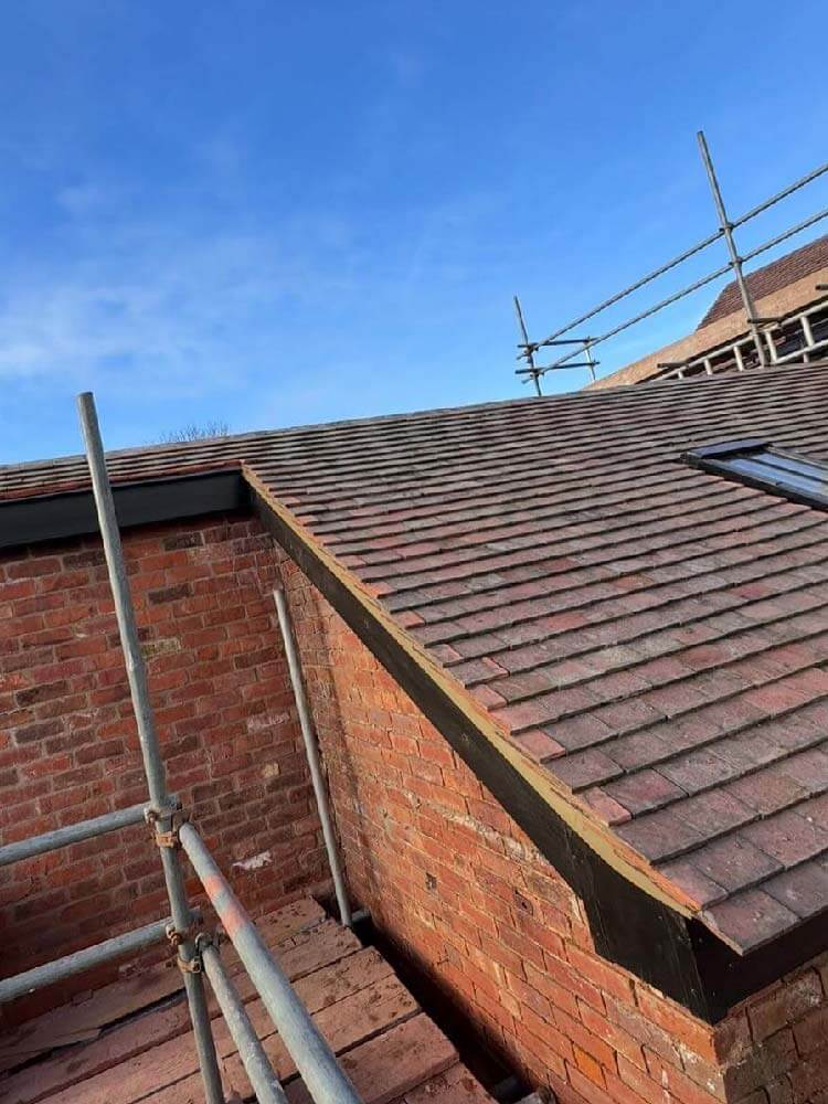 Dry ridge system fitted for weather resistance on barn conversion roof