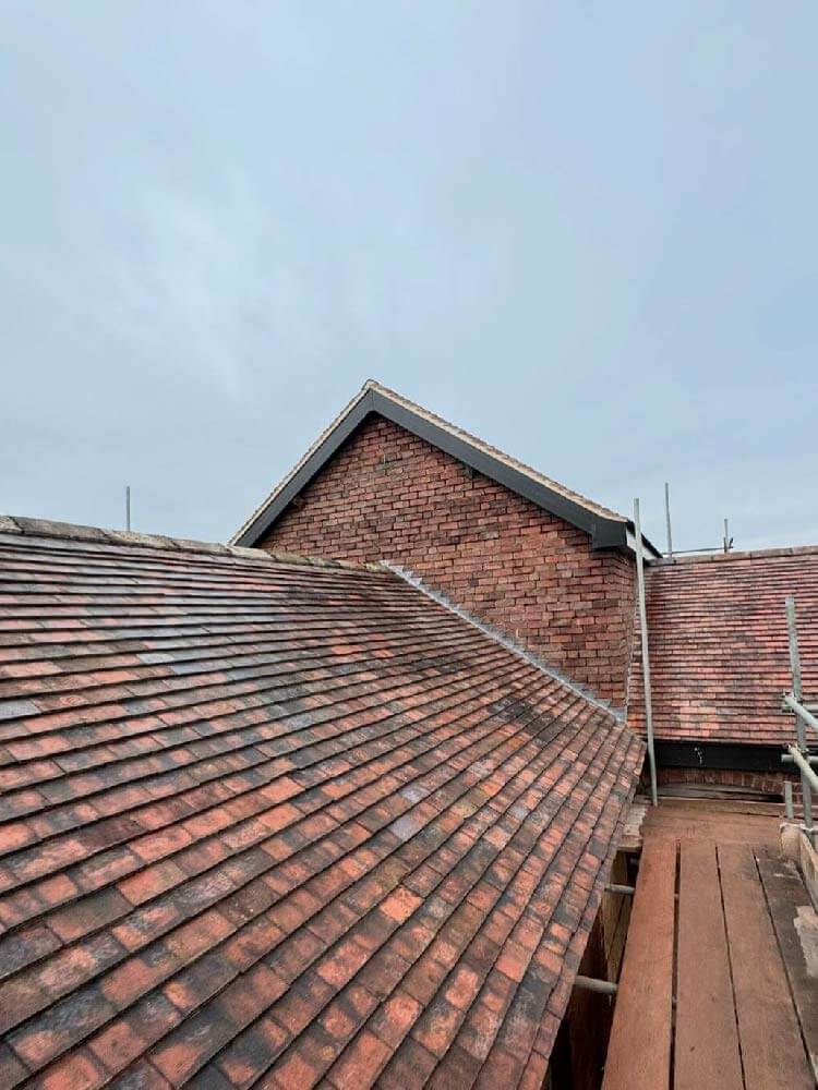 Slate roof tiles on barn conversion project in Loscoe