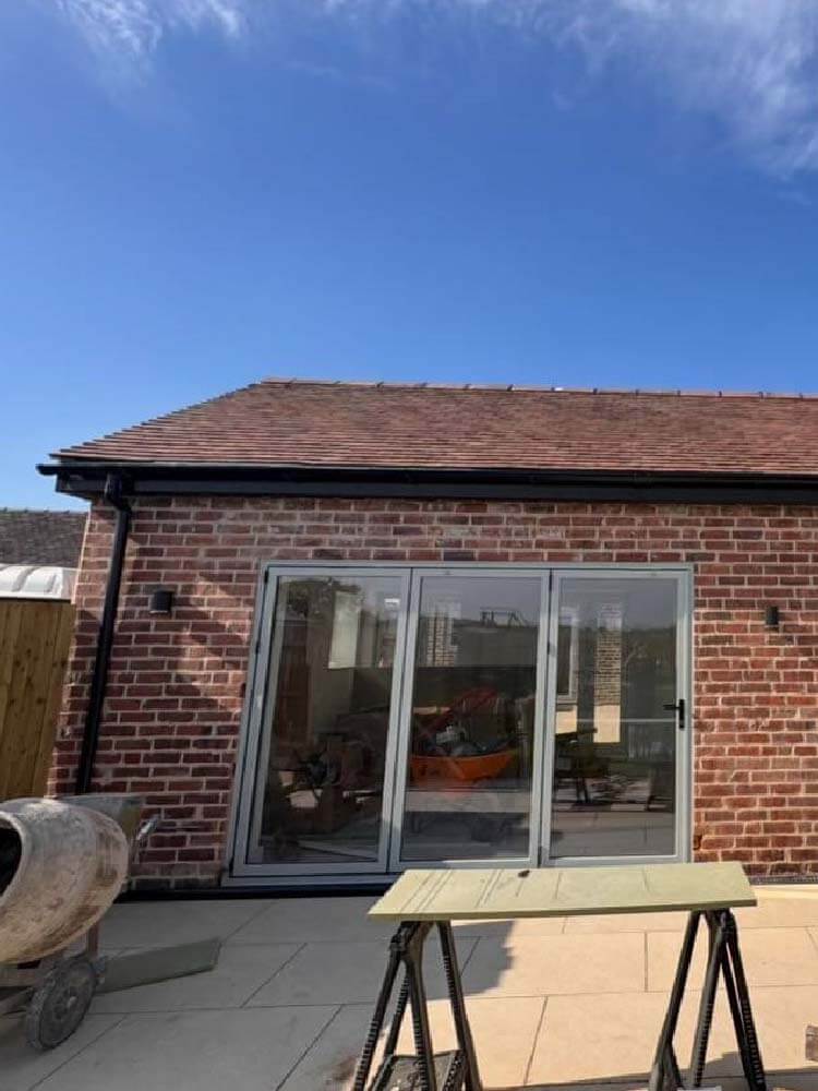 Neatly finished roof edges on barn conversion in Loscoe
