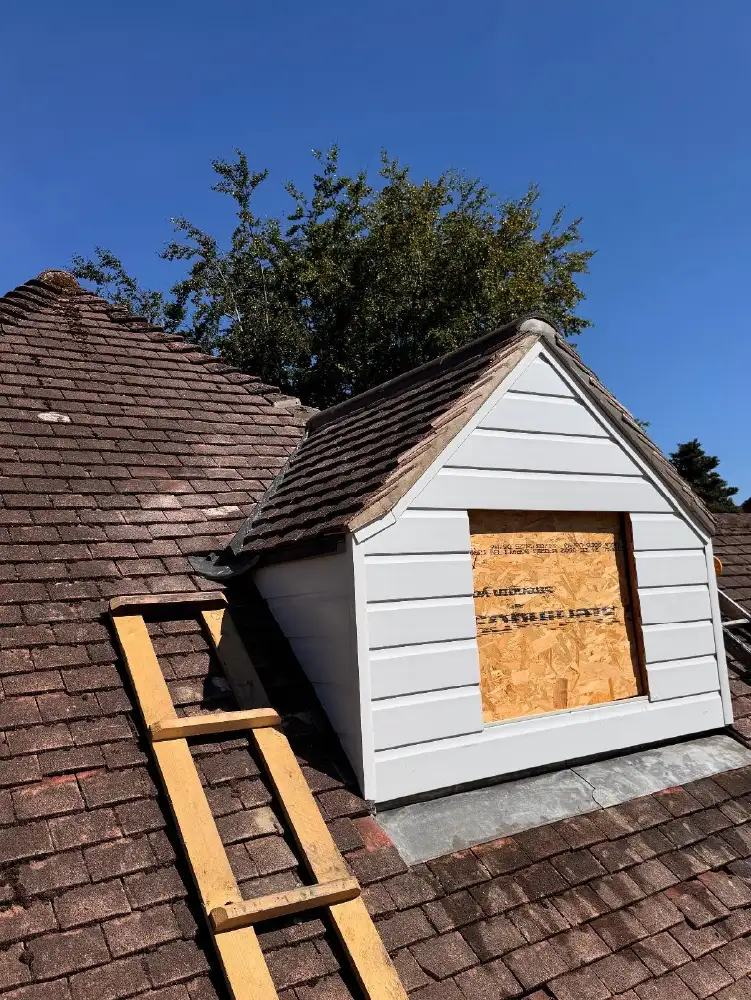 Leadwork and ridge tiles installed on new dormer roof in Ripley