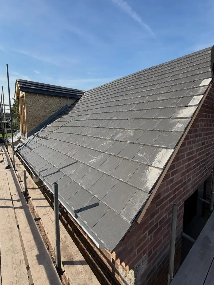 New tiled roof installation with dry ridge and verge system in Langley Mill, Derbyshire.