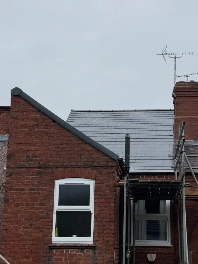 Finished cement fibre slate reroof shown from distance